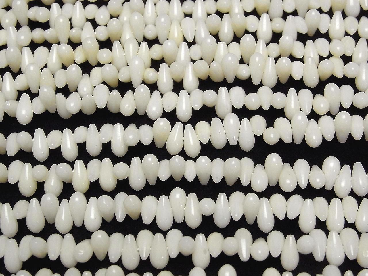 Gouttes de corail blanc (lisses) 7x4x4mm, 1 fil de perles (env. 38cm)