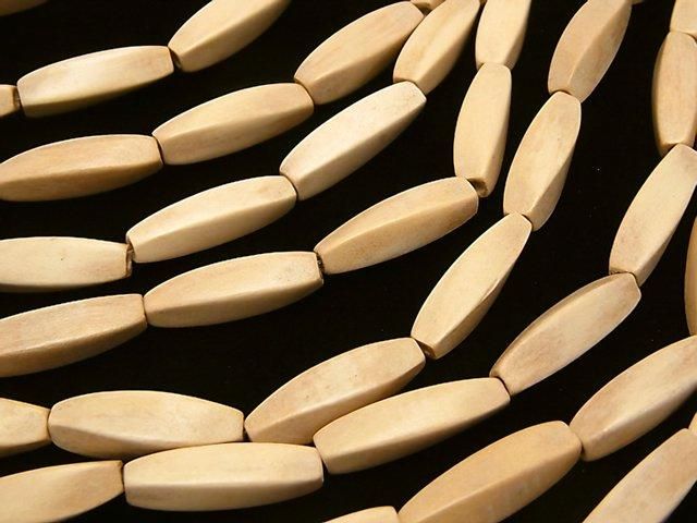 Whitewood 4Faceted Twist Faceted Rice 20x7x7mm 1strand beads (aprx.15inch/37cm)