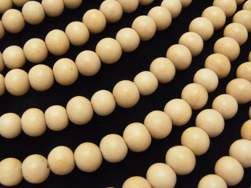 Perles en bois semi-rondes blanches 8mm 1 fil (env. 38cm)