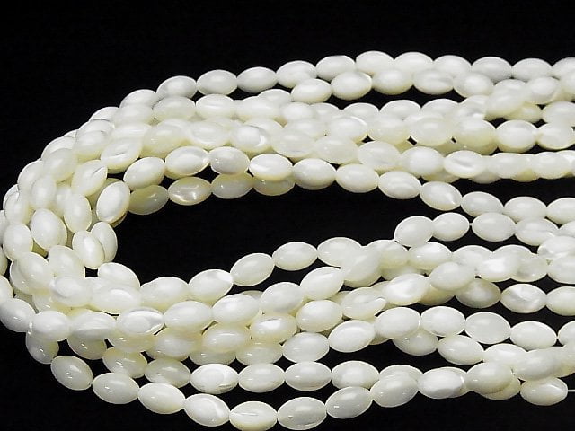 Nacre blanche en forme de grain de riz 10x7x7mm, 1 fil de perles (env. 37cm)