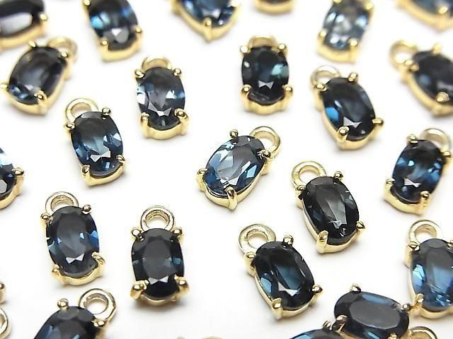 Hochwertiger London Blue Topas AAA Zargenfassung oval facettiert 6x4mm 18KGP 2 Stück