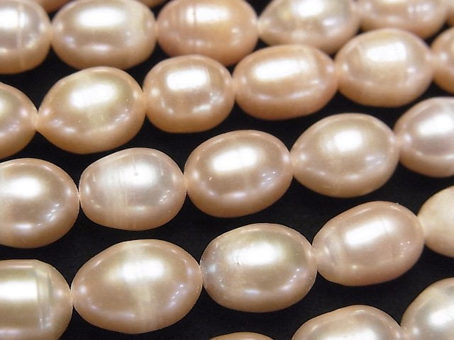 淡水珍珠 AA 米珠 10x7x7mm 粉橘色 1串珠子 (約13英吋/32公分)