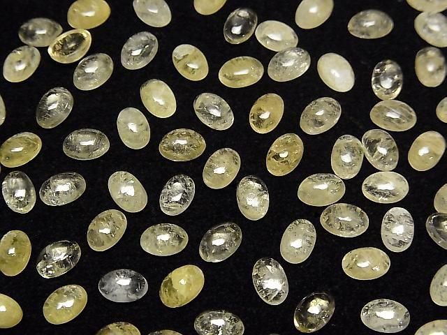 Gelber Danburit ovaler Cabochon 6x4mm 2 Stück