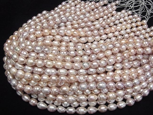 Süßwasserperle AA gewellt Reis 10x8x8mm klassisch rosa 1 Strang Perlen (ca. 13 Zoll/33 cm)