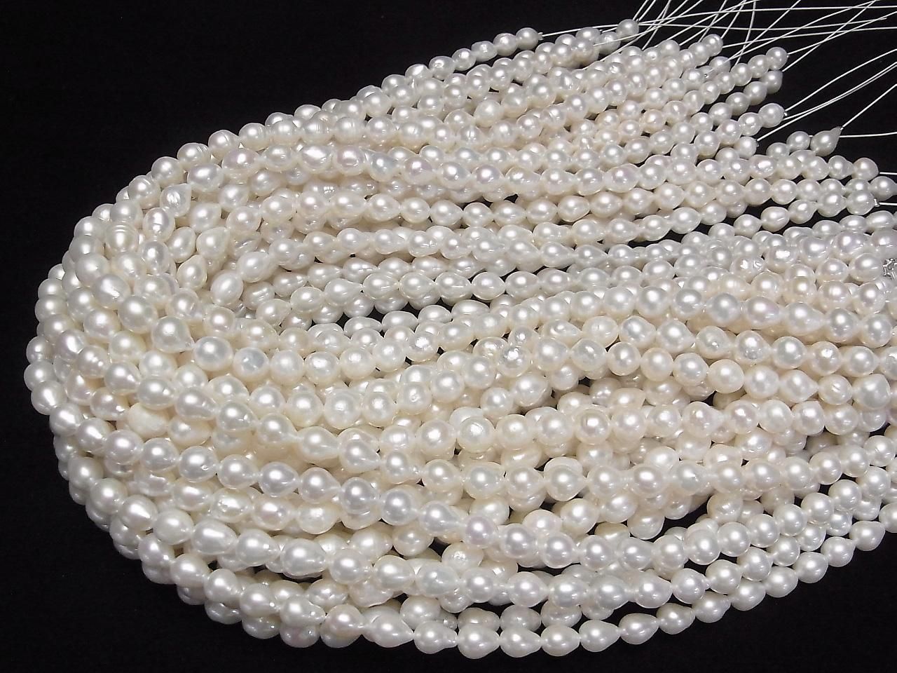Fresh Water Pearls AA Drop-Rice 8x7x7mm White 1strand beads (approx. 15inch/37cm)
