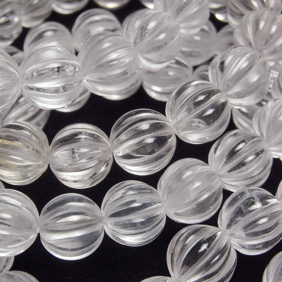 Crystal AAA- Line Carved Round 11mm 1strand beads (Bracelet)