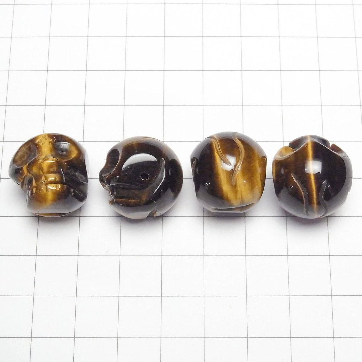 Yellow Tiger's Eye AAA- Skull with 20mm side hole 1 piece