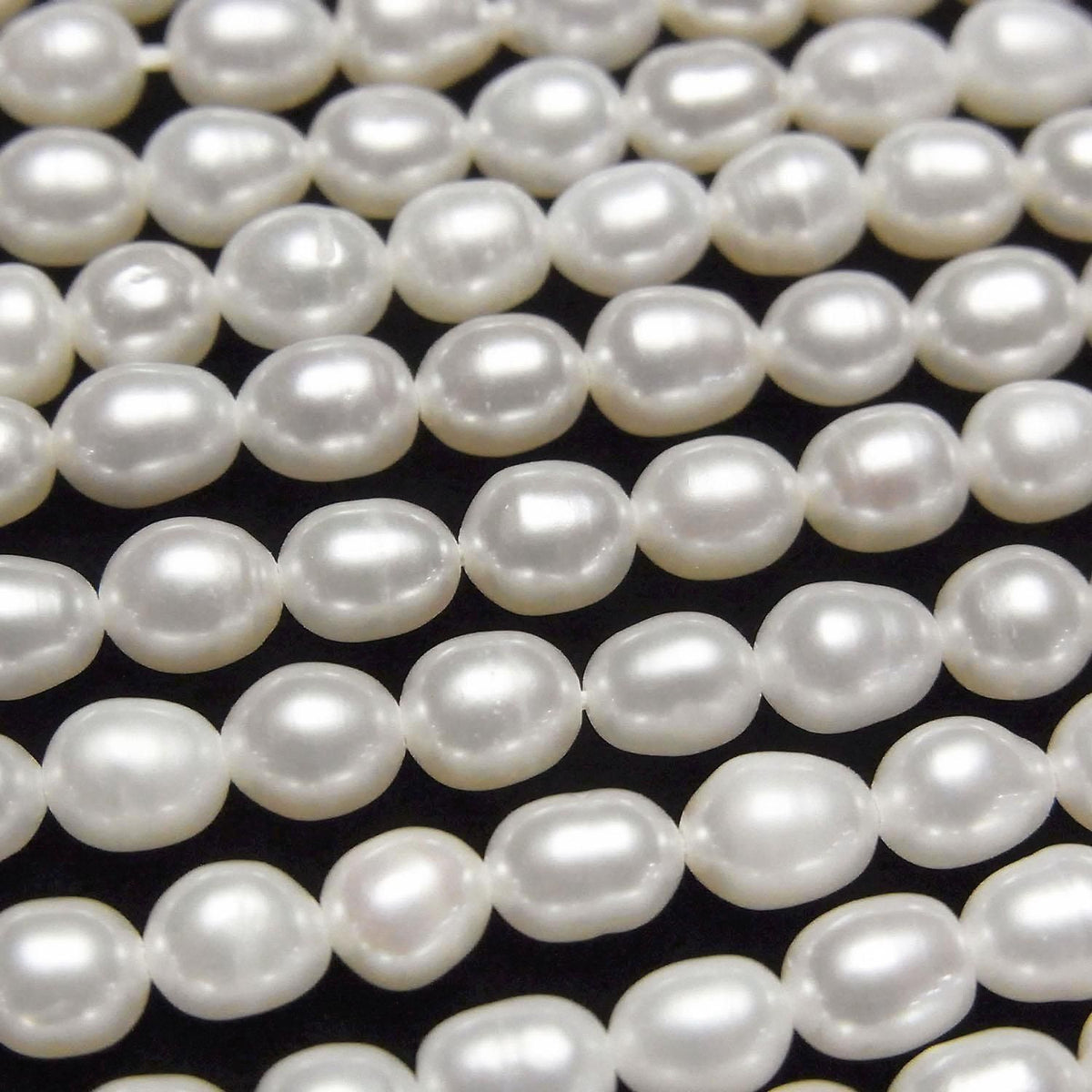 Fresh Water Pearl AA+ Rice 5x4x4mm White 1strand beads (approx. 13inch/33cm)