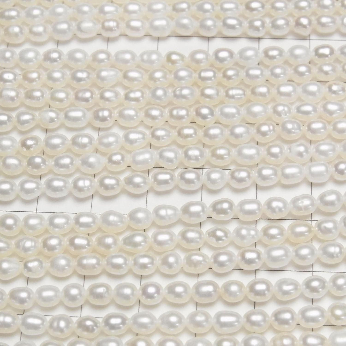 Fresh Water Pearl AA+ Rice 5x4x4mm White 1strand beads (approx. 13inch/33cm)