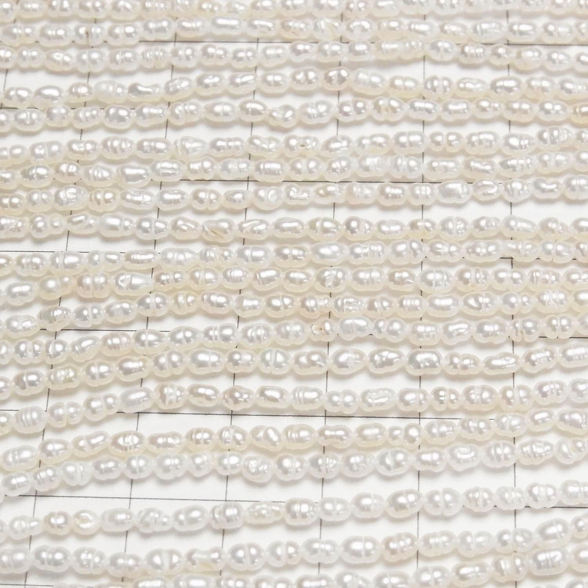 Fresh Water Pearl AA Bands with Rice 4x3x3mm White 1strand beads (approx. 14inch/34cm)