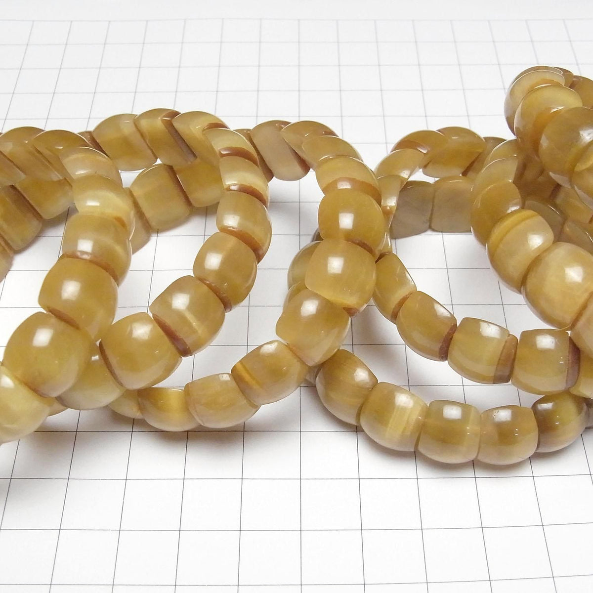 Golden Tiger's Eye AA++ 2-Hole Oval 14x10x6mm 1strand beads (Bangle Bracelet)