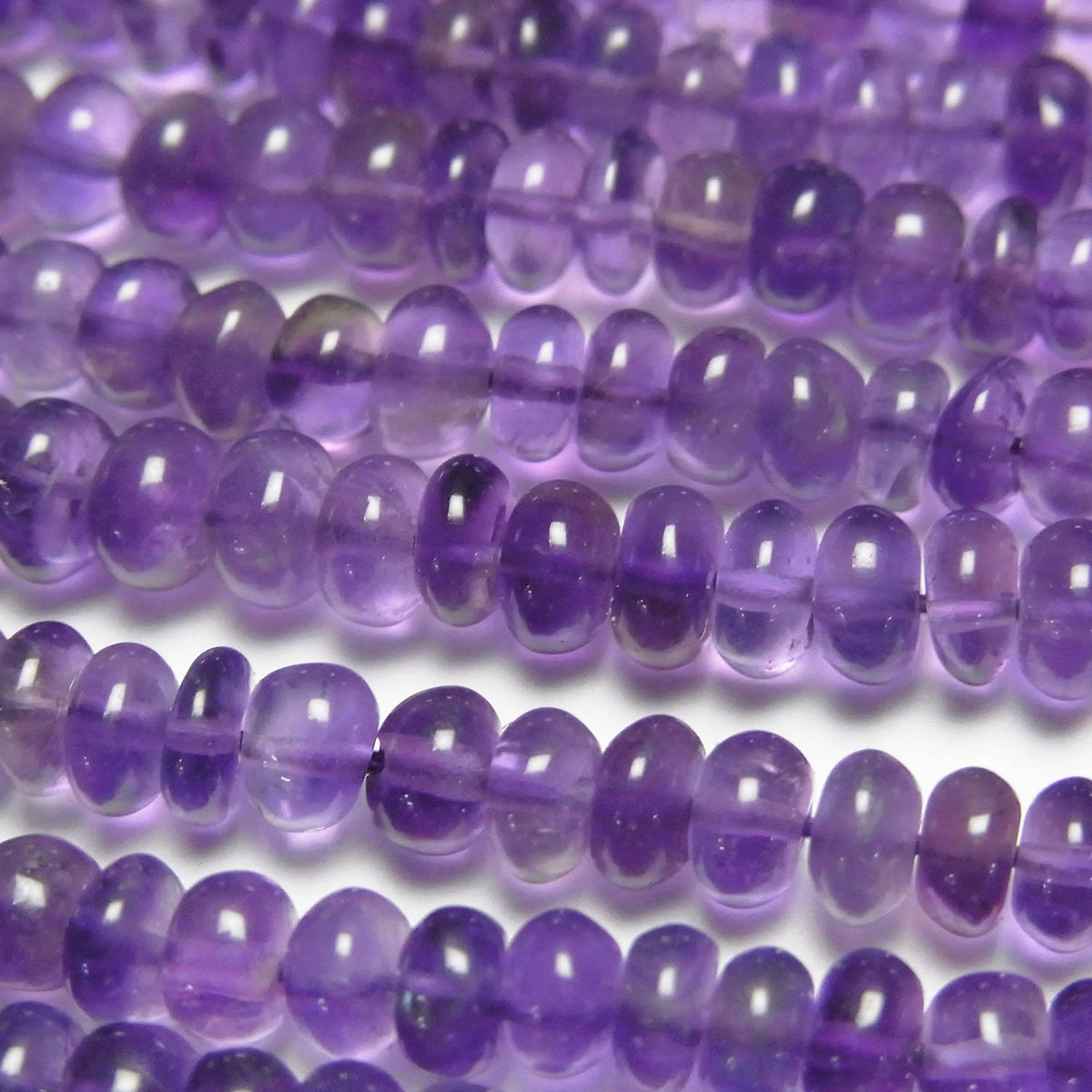 High Quality Amethyst AAA- Rondelle 1strand beads (approx. 15 inches/38 cm)