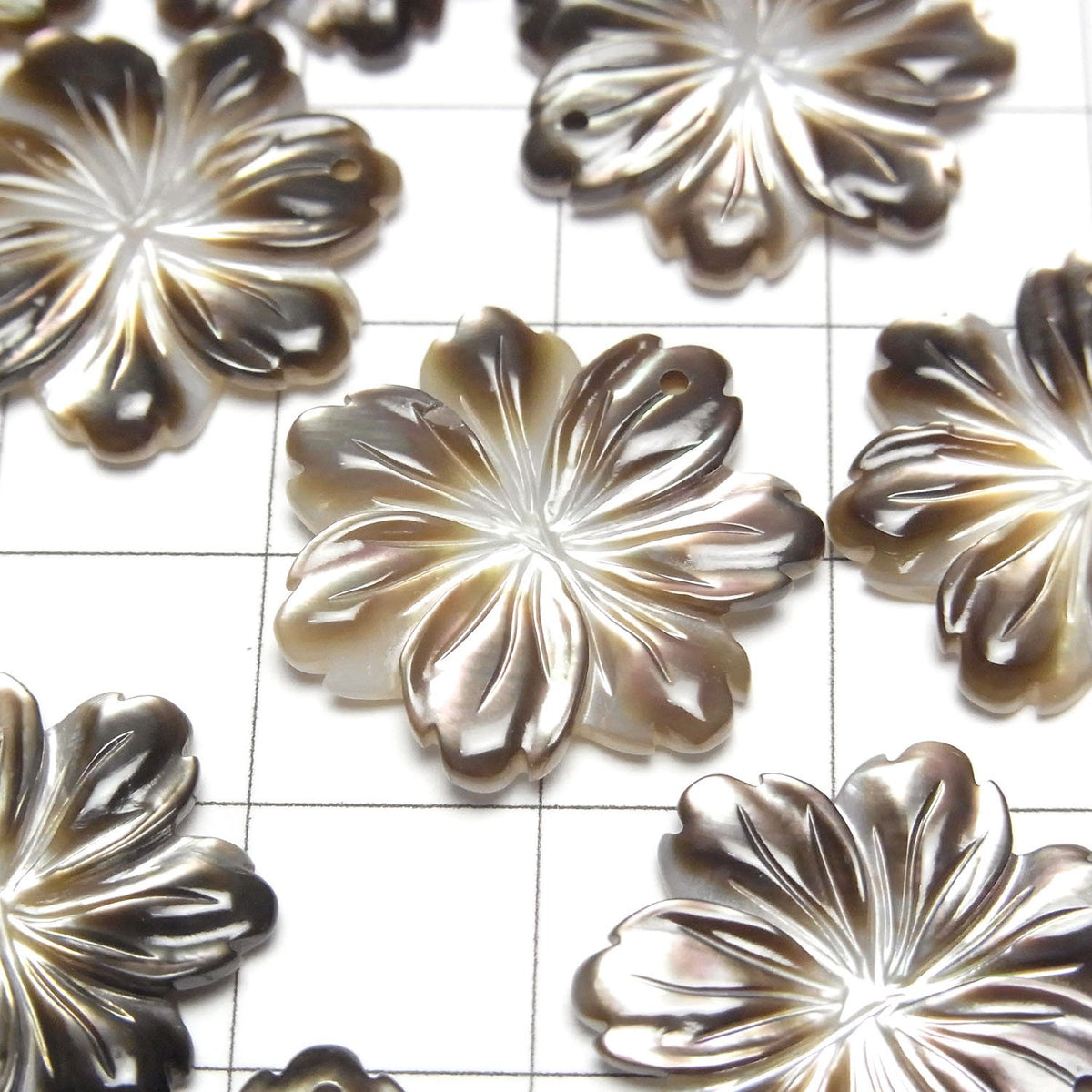 高品質黑殼AAA花20mm 2顆 $5.79