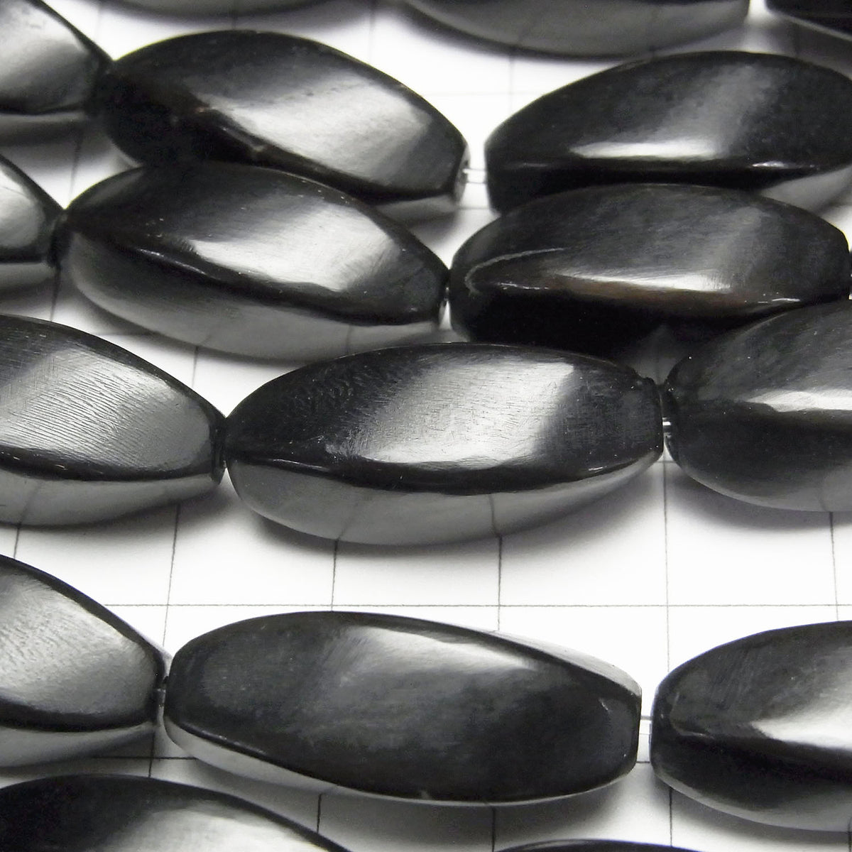 1strand $9.79! Buffalo Horn 4Faceted Twist Faceted Rice 25x10x10 Black 1strand beads (aprx.15inch / 37cm)