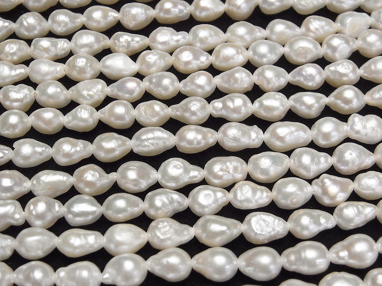 Fresh Water Pearl AA Natural Drop 7x6x6mm White 1strand beads (aprx.14inch/35cm)