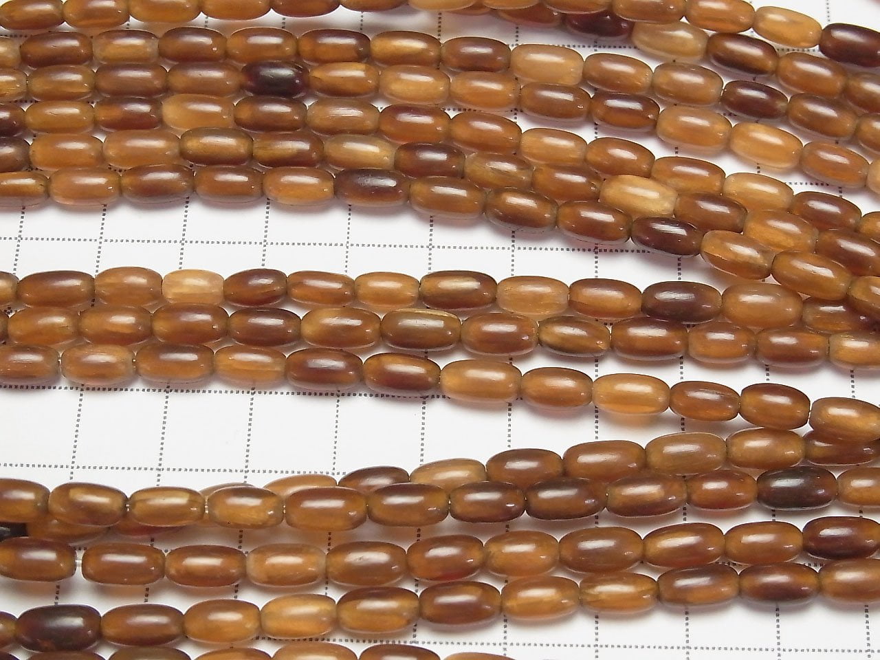 Perles en corne de buffle (riz) 9x4x4mm marron 1 fil (environ 38cm)