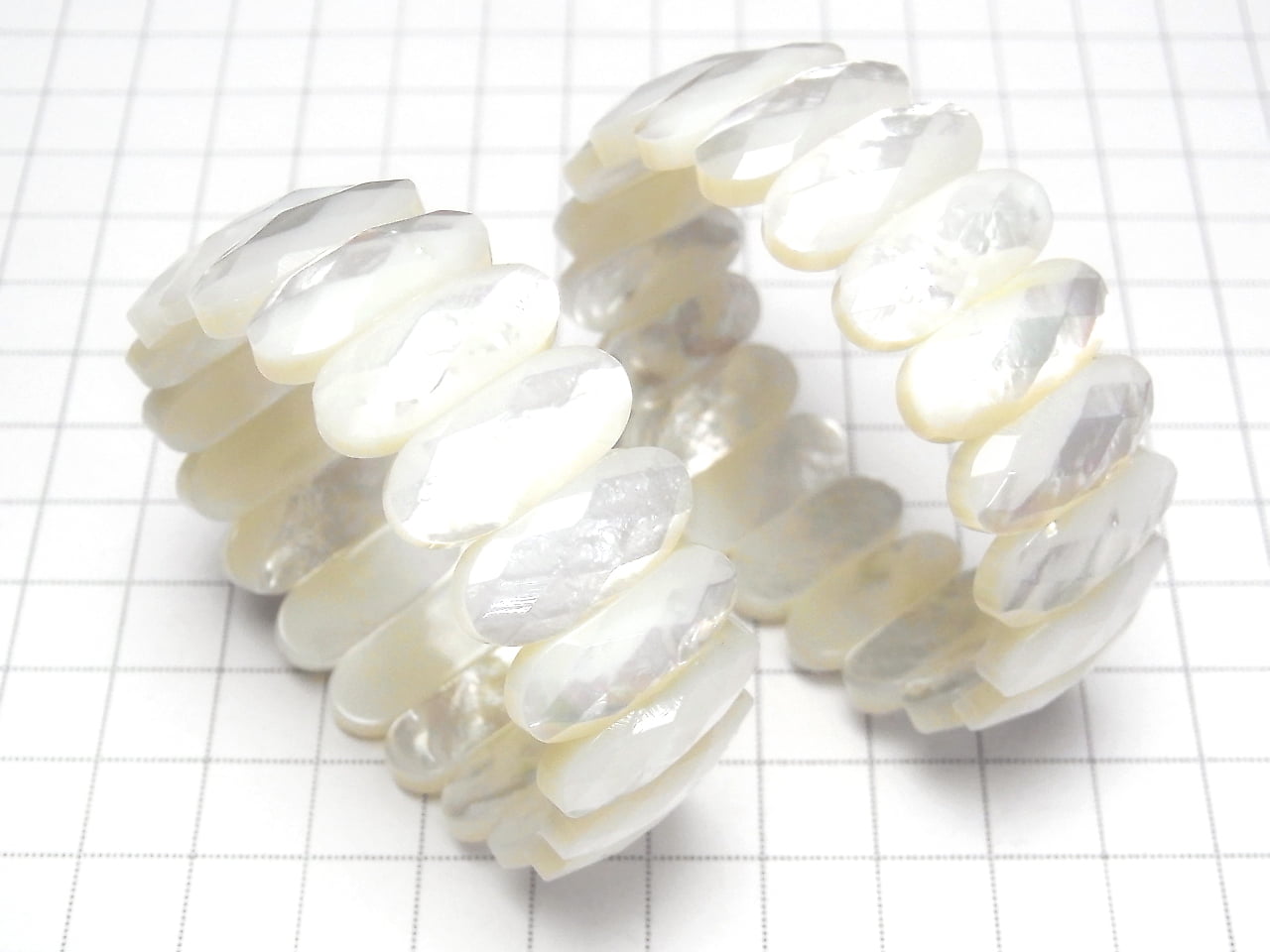 優質白色貝殼 AAA 2 孔刻面橢圓形 20x9x5 毫米手鍊