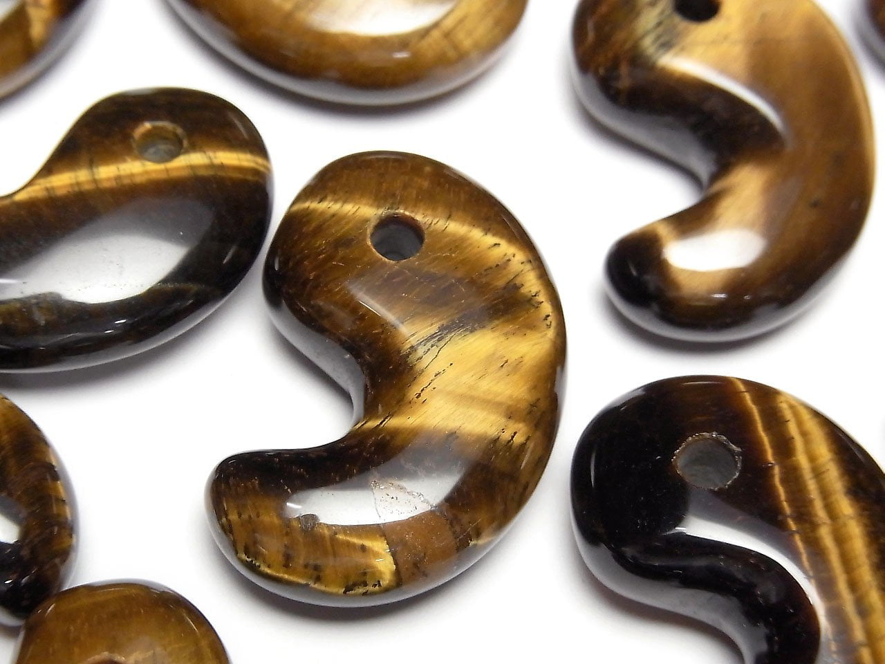 Gelber Tigerauge AAA- Komma-förmige Perle 30x20mm 3Stk