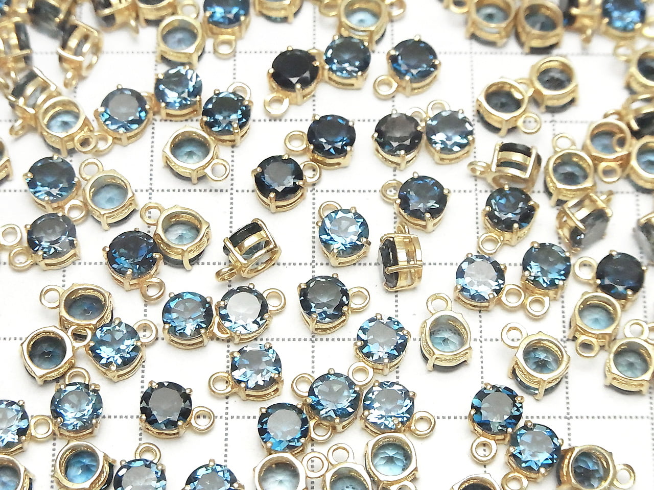 Topaze bleue de Londres de haute qualité AAA sertie clos ronde facettée 6x6mm 18KGP 1 pièce