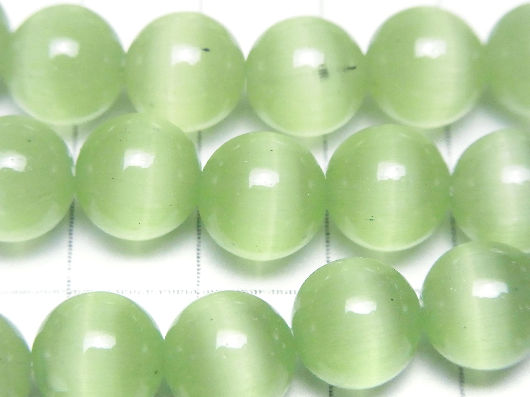Pastel green color Cat's Eye Round 10mm 1strand beads (aprx.15inch/36cm)
