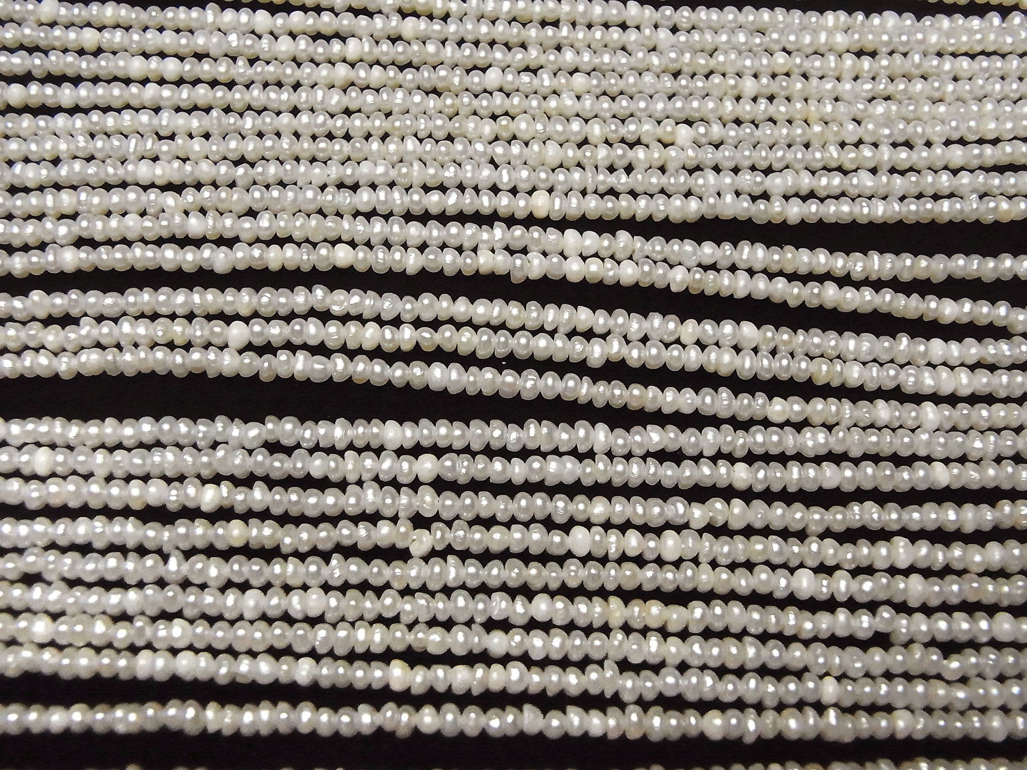 淡水珍珠 AA 白色算盤珠 2.5mm 1串珠子(約15英吋/36公分)