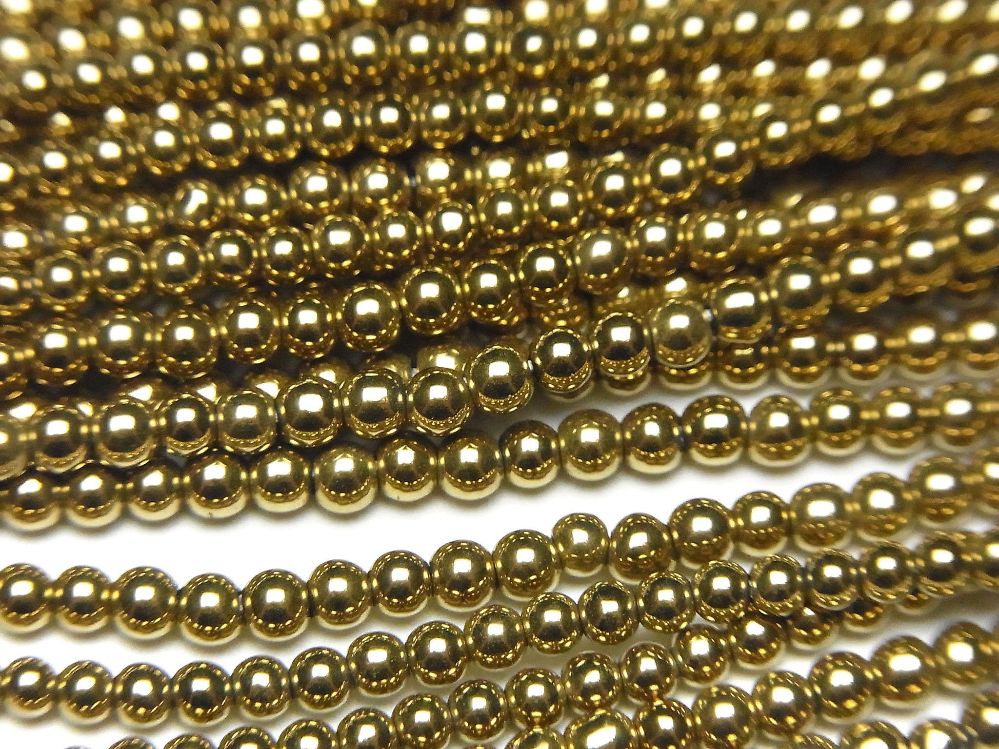 Hematite Round 2mm gold coated 1strand beads (aprx.15inch/38cm)