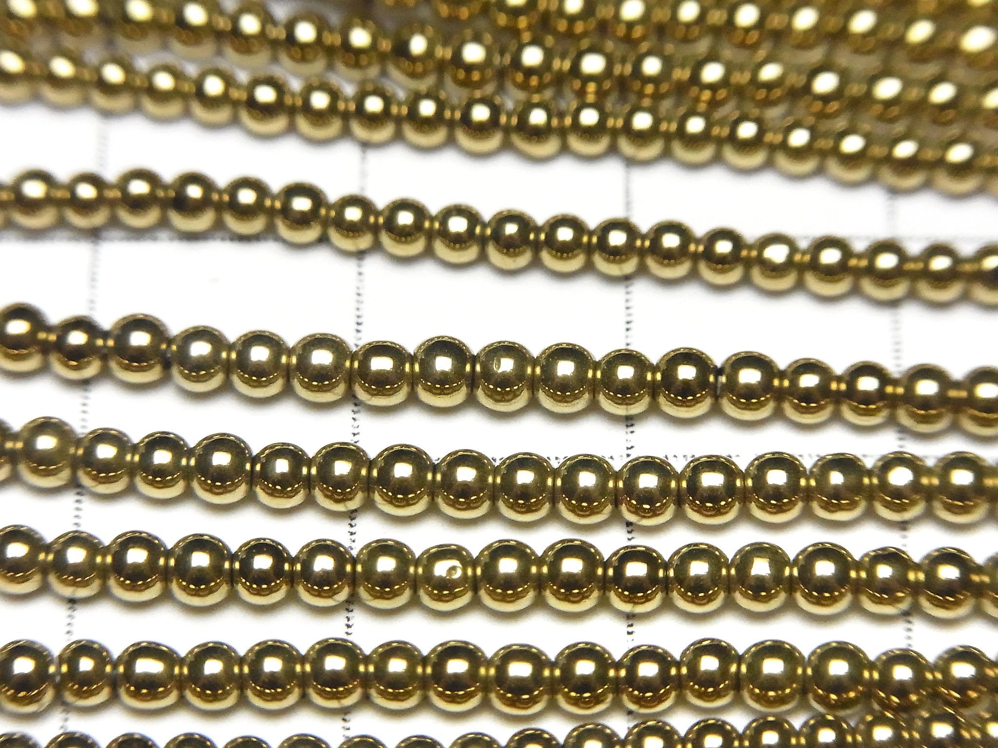 Hematite Round 2mm gold coated 1strand beads (aprx.15inch/38cm)
