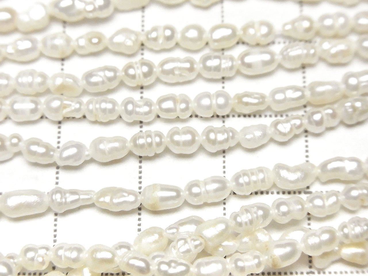 Fresh Water Pearl AA Wrinkle Rice 4x3x3mm White 1strand beads (aprx.13inch/33cm)