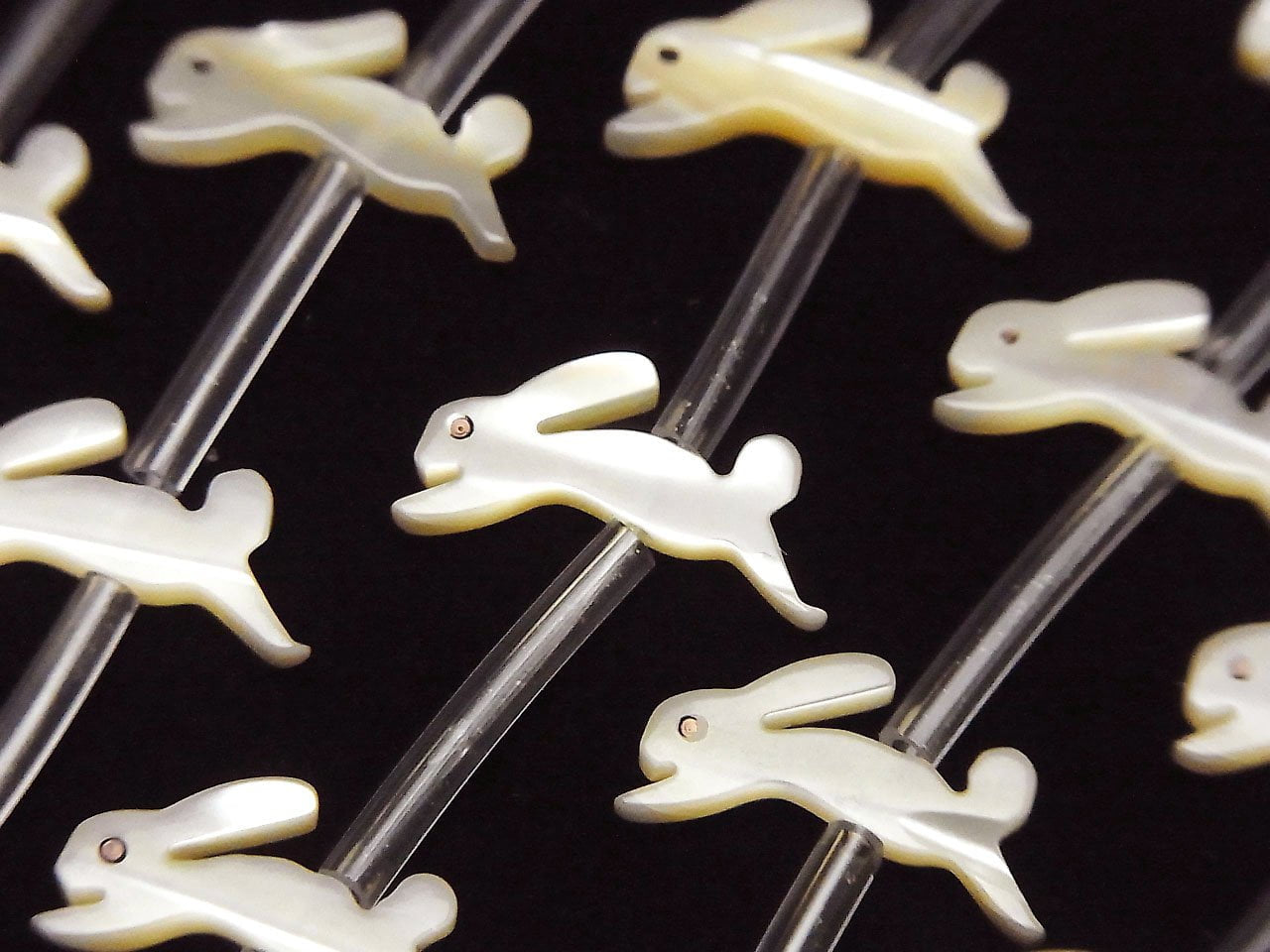 High quality Mother of Pearl MOP AAA Beige rabbit shape half or 1strand beads (Approx 18pcs )