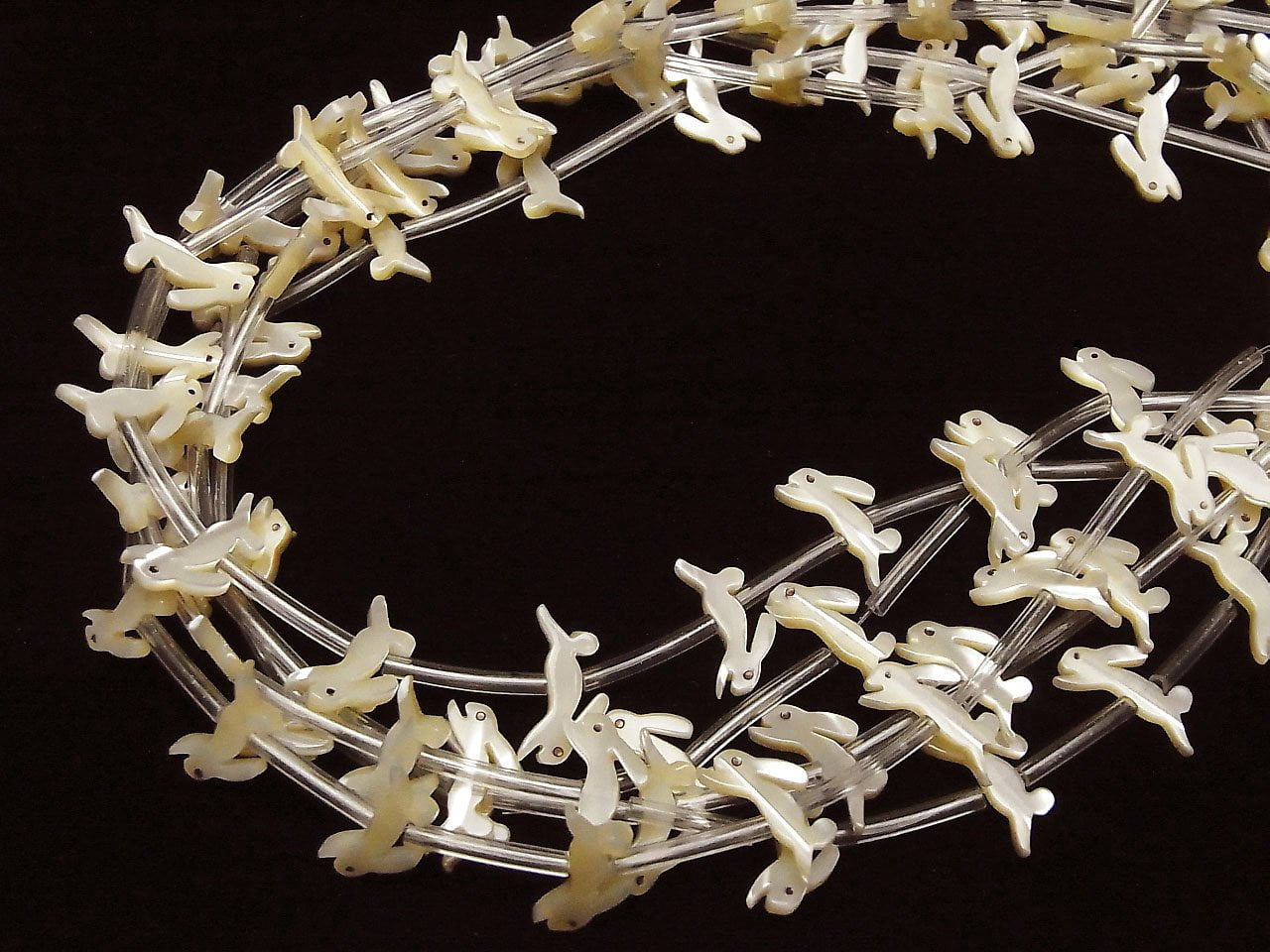 High quality Mother of Pearl MOP AAA Beige rabbit shape half or 1strand beads (Approx 18pcs )