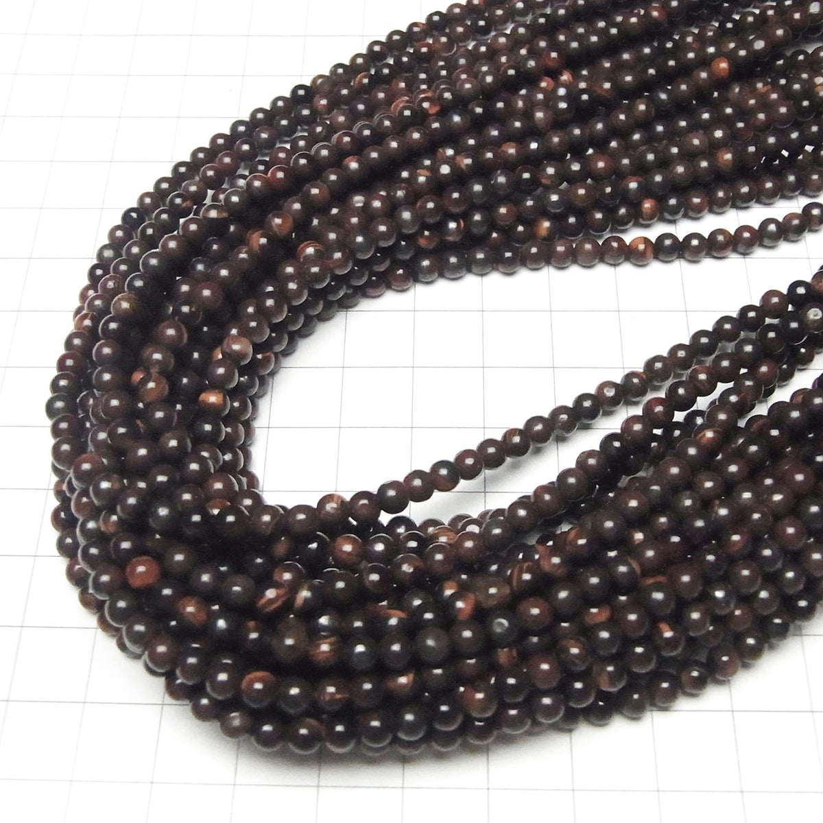 Perles rondes Œil de Tigre en Fer 4mm 1 fil (env. 38cm)