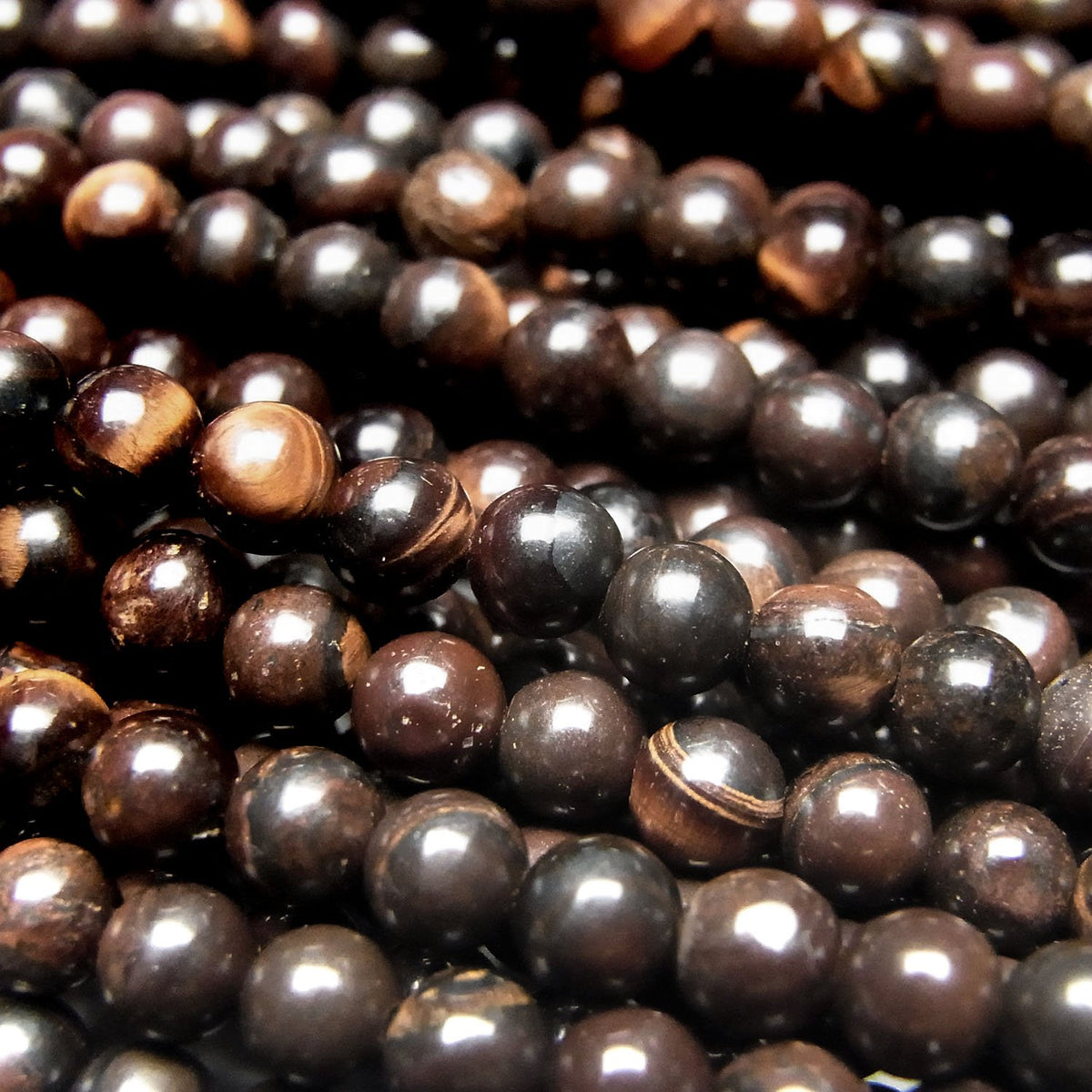 Perles rondes Œil de Tigre en Fer 4mm 1 fil (env. 38cm)