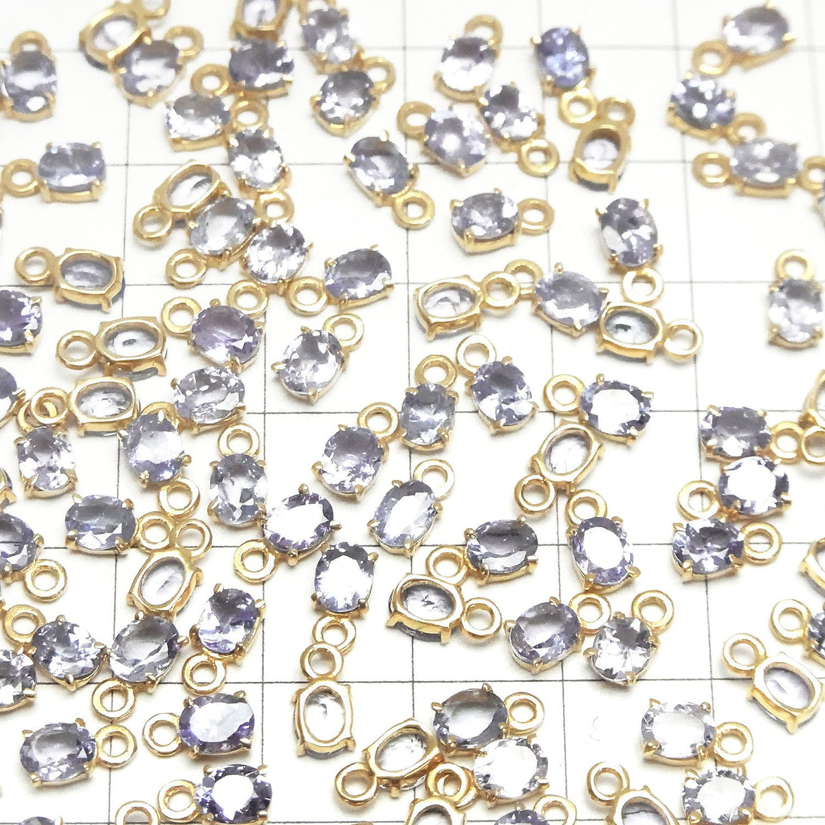 高品質坦桑石 AAA - 扁平鑲嵌 橢圓形刻面 5x4mm 18KGP 1件