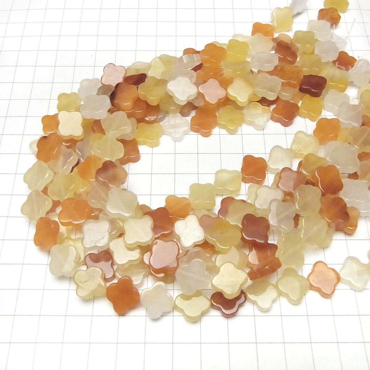 Perles en aventurine orange et jaune motif fleur 13x13mm, 1 fil (environ 36cm)