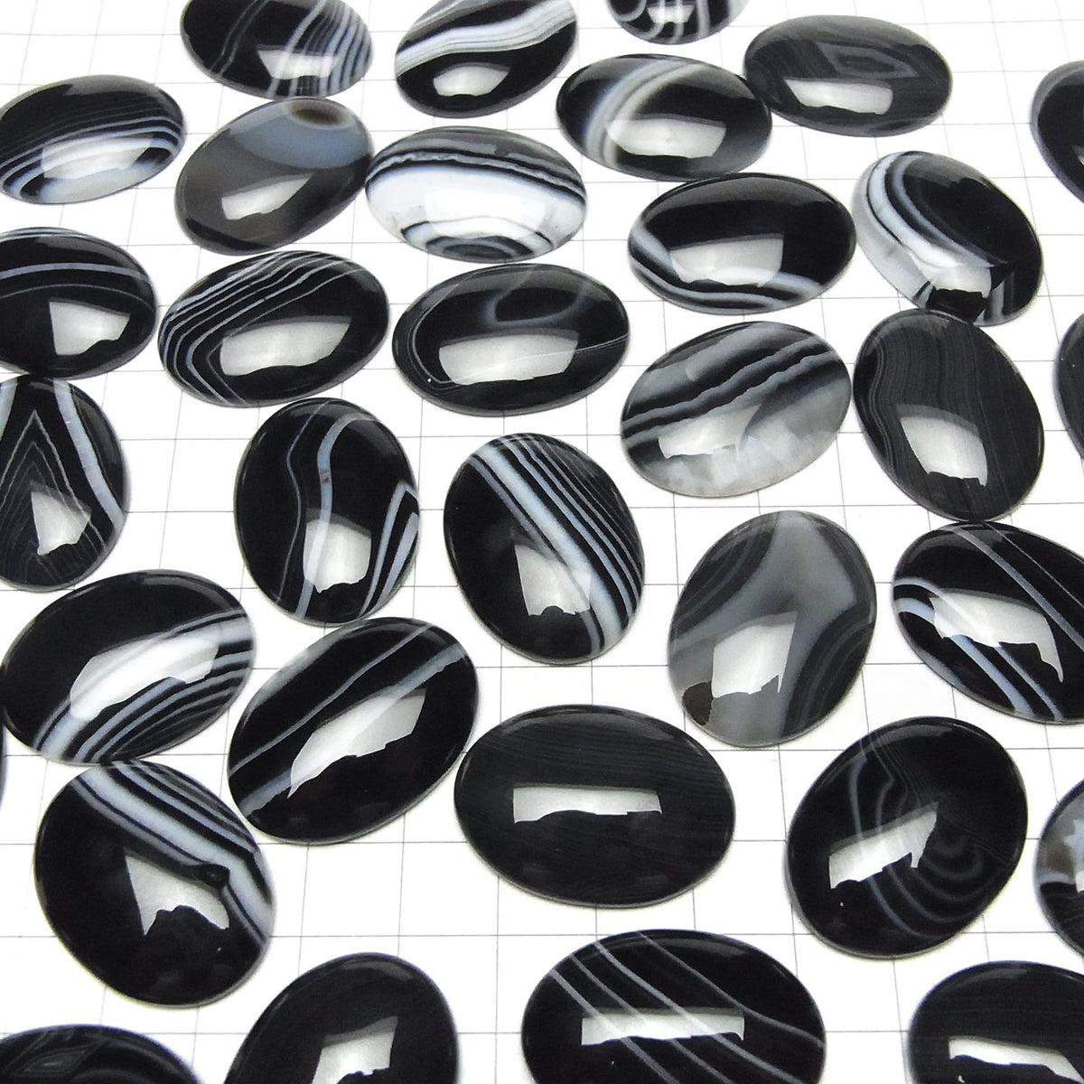 Cabochon ovale Onyx rayé AAA 30x22mm 1 pièce