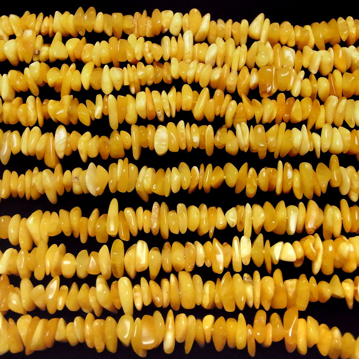 Pépites d'ambre de la Baltique (petits éclats) couleur miel 1 fil de perles (environ 38 cm)