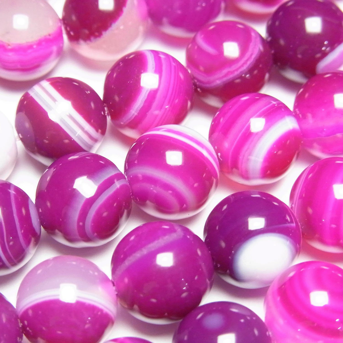 Agate Rose Rayée Ronde 10mm 1fil de perles (env. 15po/36cm)
