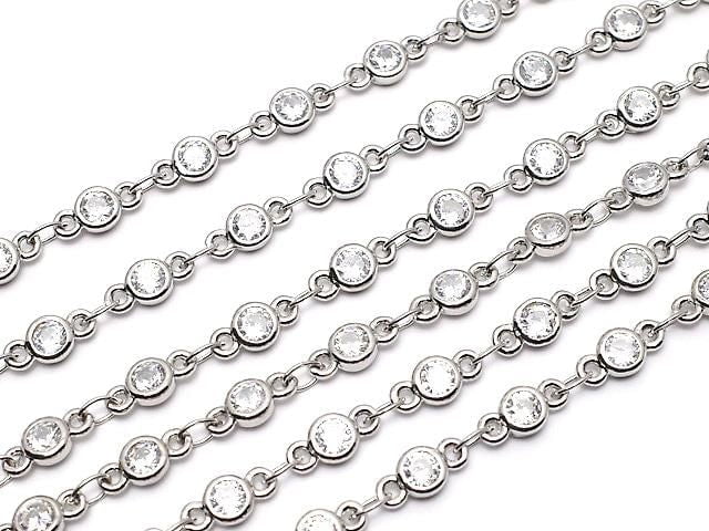 Silver-colored chain with CZ round faceted metal parts, 10cm.
