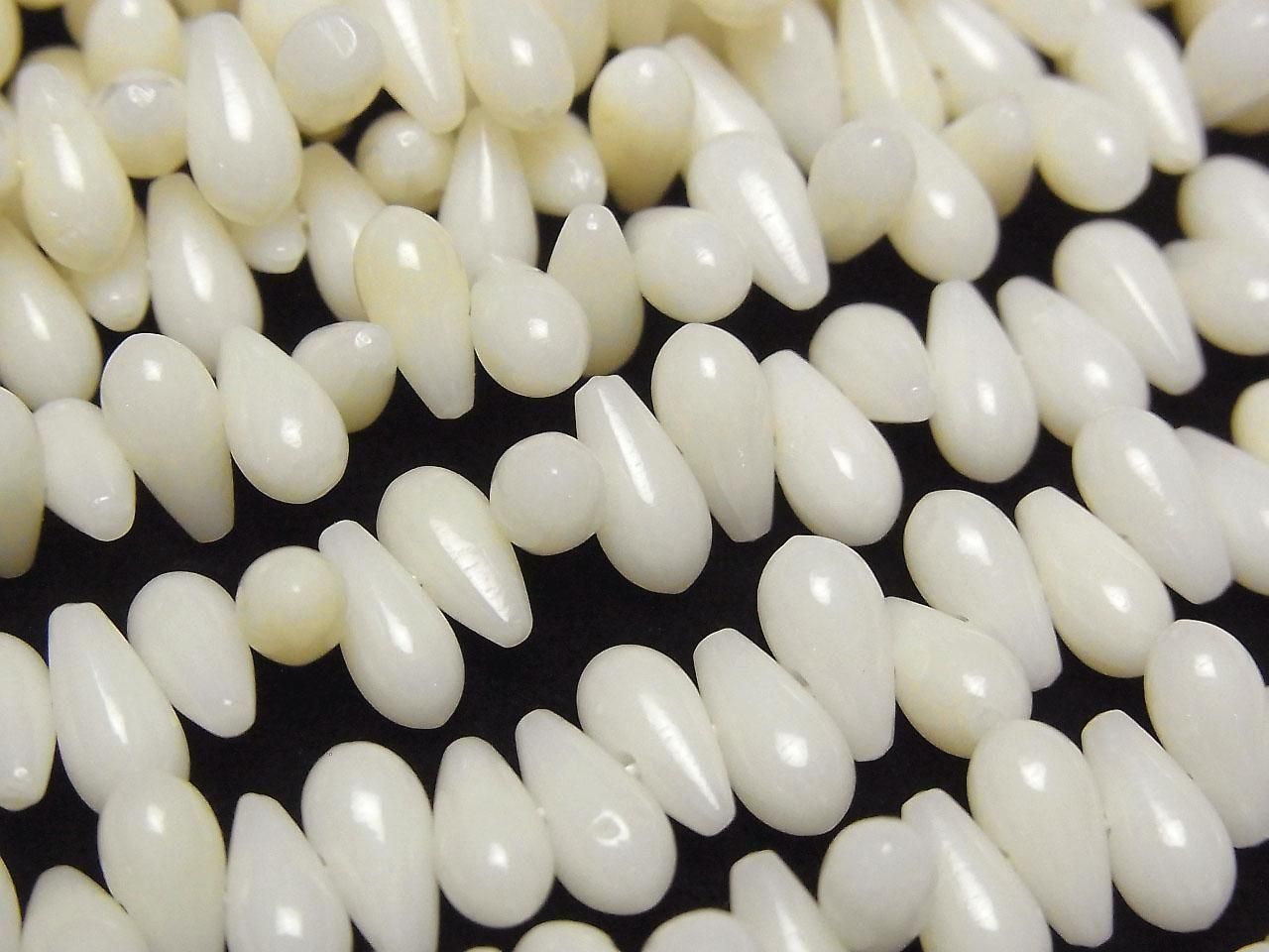 Gouttes de corail blanc (lisses) 7x4x4mm, 1 fil de perles (env. 38cm)