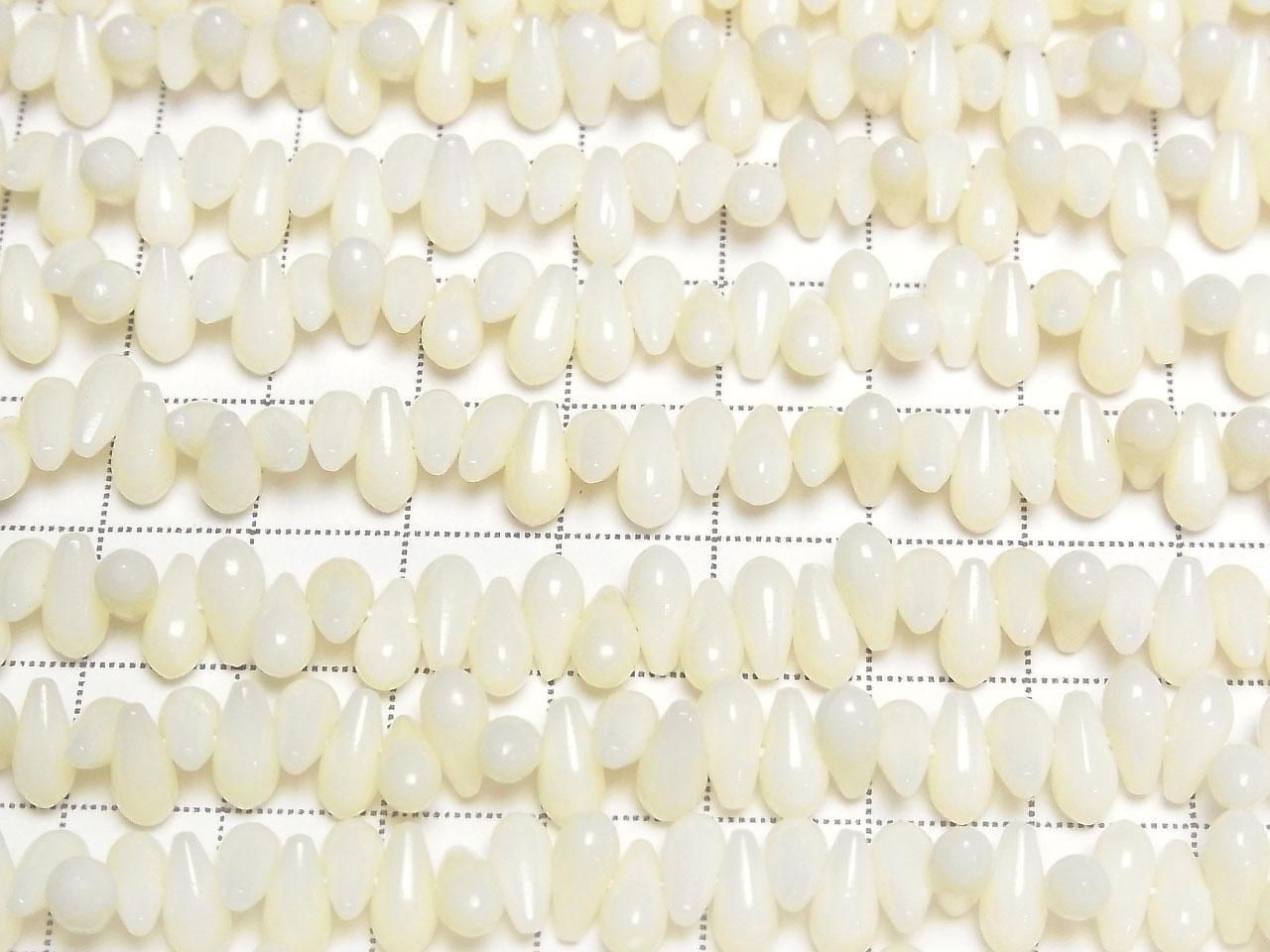 Gouttes de corail blanc (lisses) 7x4x4mm, 1 fil de perles (env. 38cm)