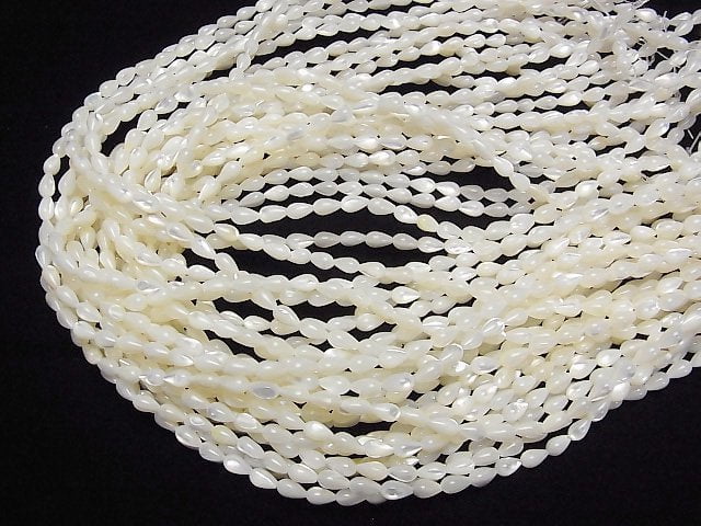 [Video] High quality white shell (Silver-lip Oyster) AAA Vertical Hole Drop 7x4x4mm White 1strand beads (aprx.15inch/37cm)