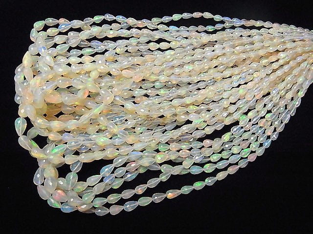 [Video]High Quality Ethiopia Opal AAA Vertical Hole Faceted Drop half or 1strand beads (aprx.15inch/38cm)