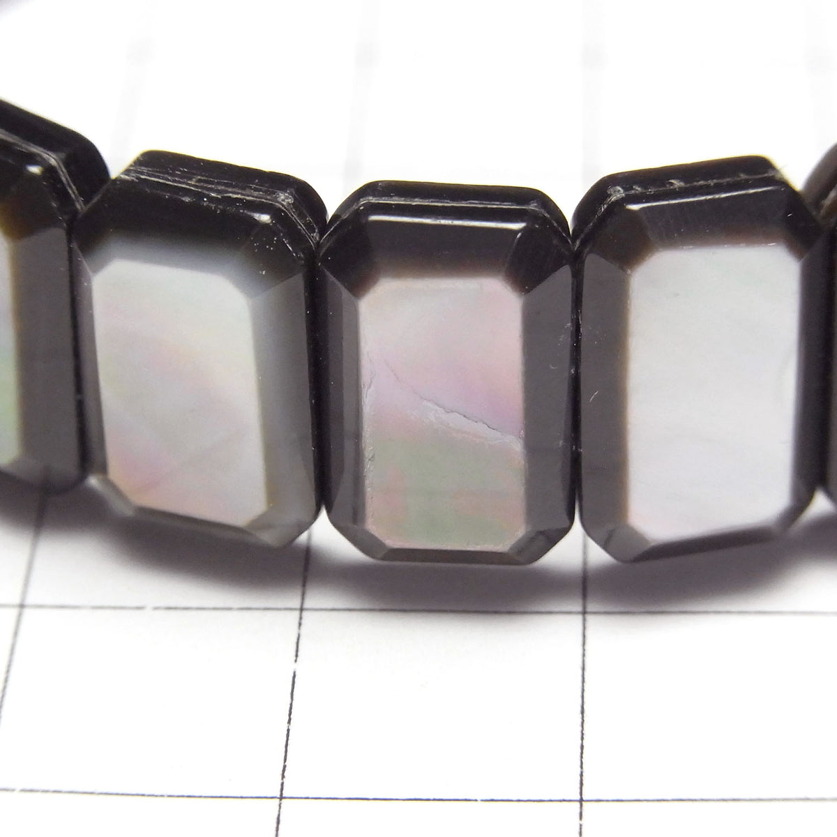 Hochwertige schwarze Muschel AAA 2 Löcher facettierte Rechteck 14x9x5mm 1 Strang (Bangle-Armband)