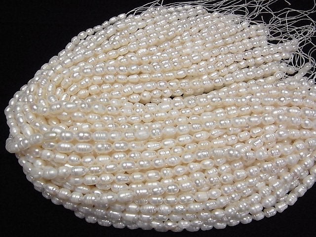 [Video] Fresh Water Pearl AA Wrinkle Rice 8x5x5mm White 1strand beads (aprx.13inch/33cm)