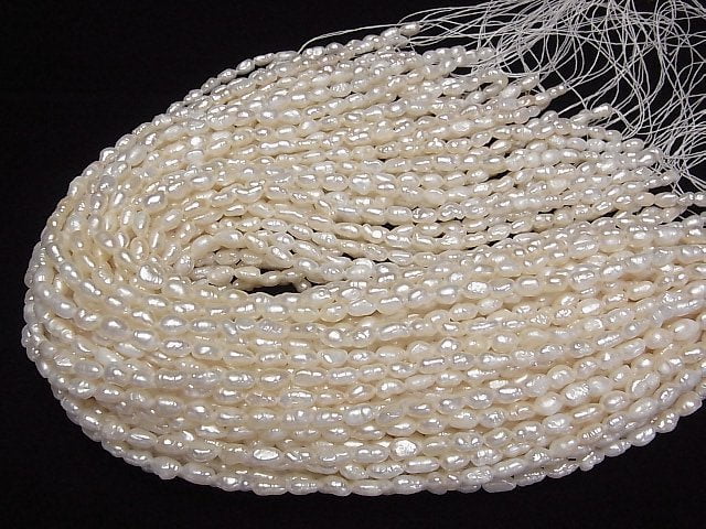 [Video] Fresh Water Pearl AA Baroque-Rice 7-9mm White 1strand beads (aprx.13inch/33cm)