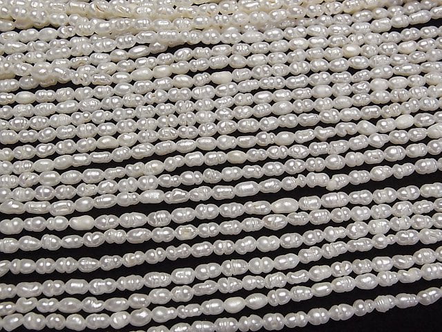 [Video] Fresh Water Pearl Keshi Pearl AA Rice-Baroque 5x3x3mm White 1strand beads (aprx.13inch/33cm)