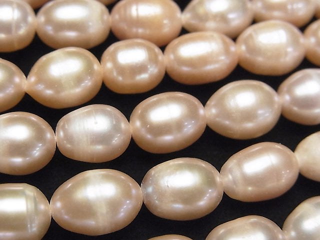 [Video] Fresh Water Pearl AA Rice 10x7x7mm Pink Orange 1strand beads (aprx.13inch/32cm)