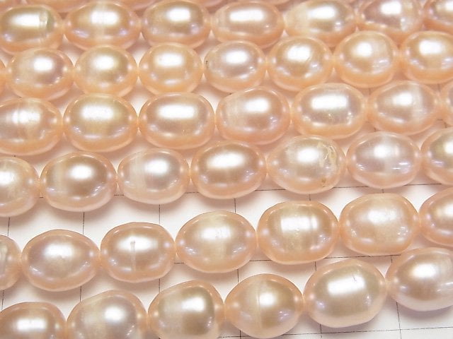 [Video] Fresh Water Pearl AA Rice 10x7x7mm Pink Orange 1strand beads (aprx.13inch/32cm)