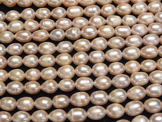 [Video] Fresh Water Pearl AA Rice 10x7x7mm Pink Orange 1strand beads (aprx.13inch/32cm)