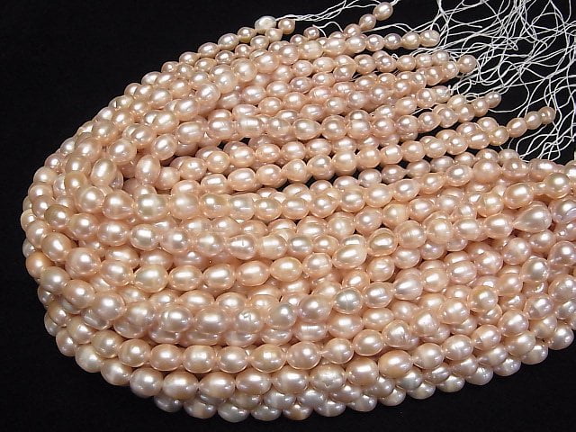 [Video] Fresh Water Pearl AA Rice 10x7x7mm Pink Orange 1strand beads (aprx.13inch/32cm)